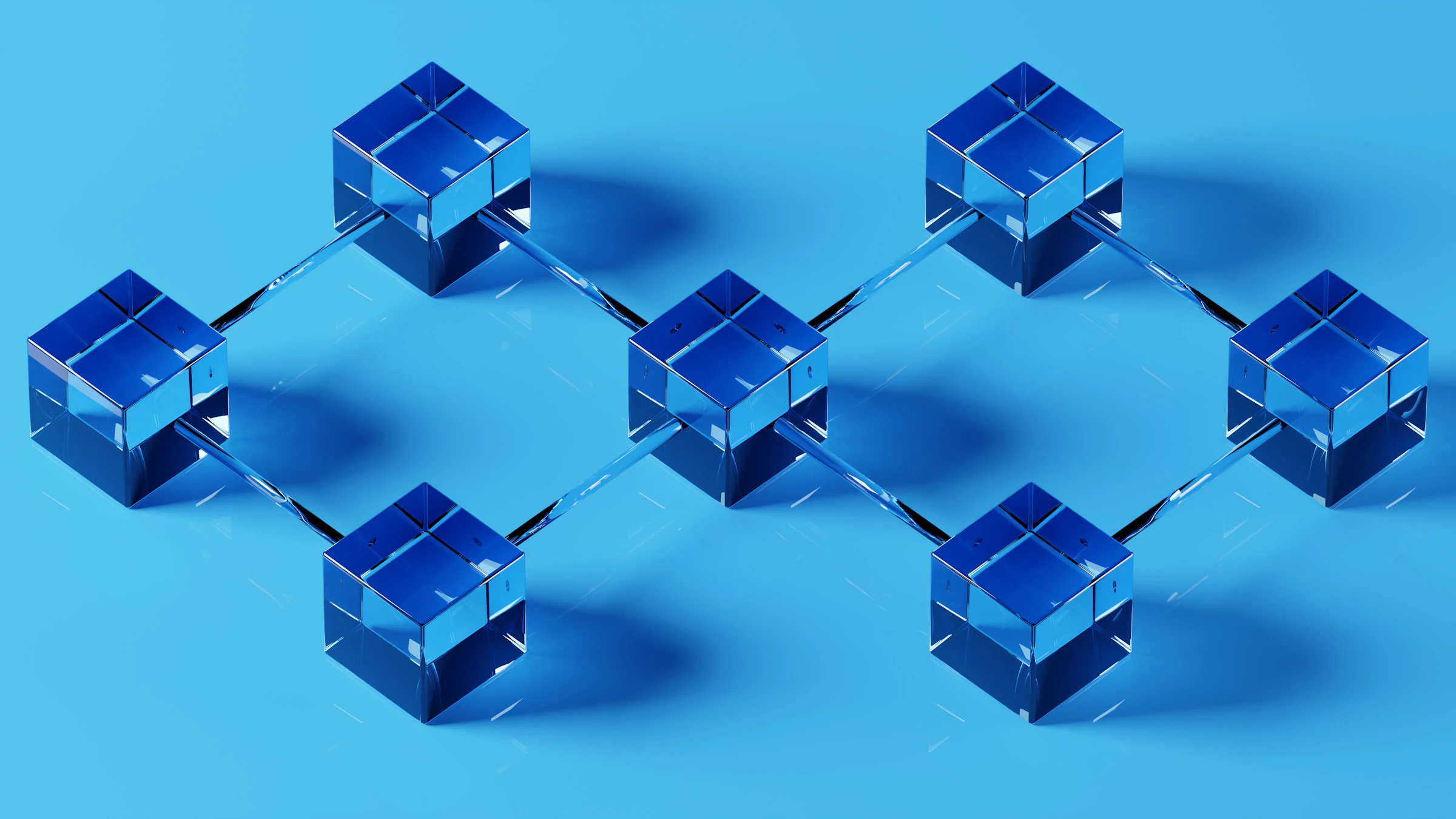 Glass blue cubes linked together in a chain on a blue background